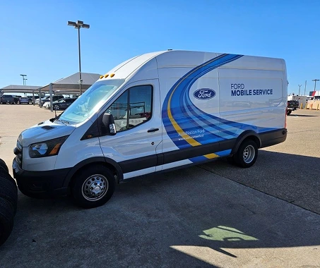 Ford mobile service van outside the dealership