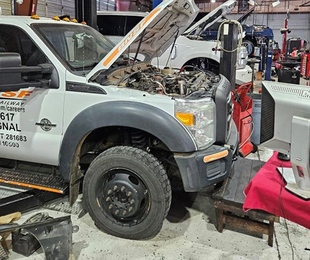 Ford commercial truck being serviced
